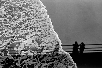 USA. Santa Monica, California. 1979. Shadows on sea and sand.